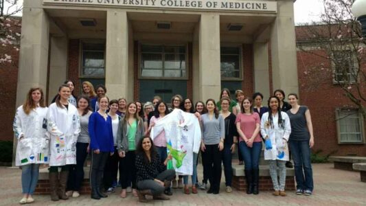 Students in Neurobiology & Anatomy at Drexel Med design lab coats to recognize women in science. (Photo courtesy of Timothy Austin)